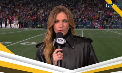 Erin Andrews cambia su abrigo de piel sintética por cuero durante el partido de los 49ers contra los Seahawks